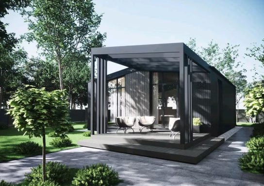 Moderne schwarze Gartenlaube mit großflächigen Fenstern und attraktivem Außenbereich.
