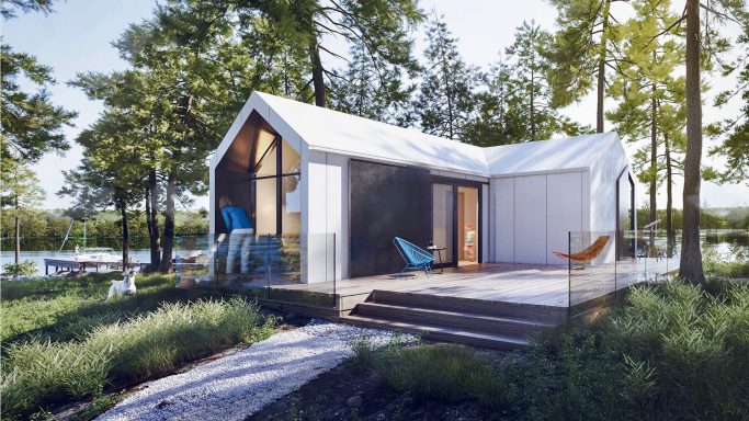 Moderne Hütte am Wasser, umgeben von Bäumen, mit Terrasse und bunten Stühlen.